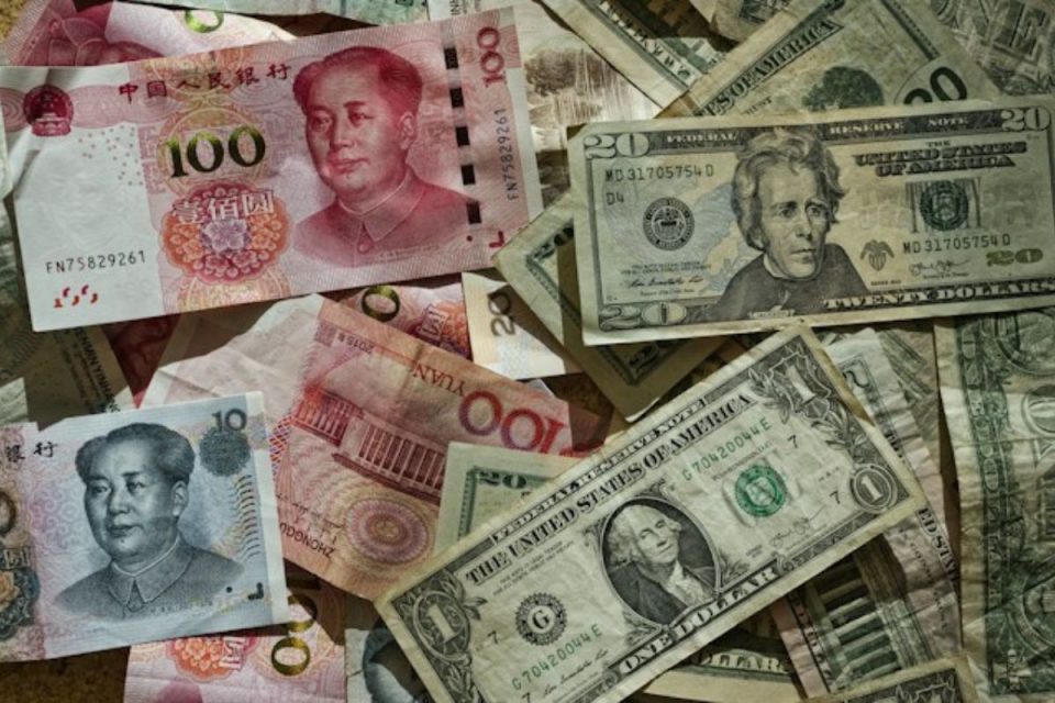 Yuan e Dólar